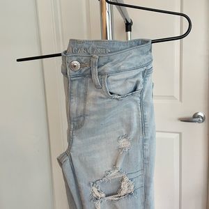 Light washed, American Eagle Next Level Stretch distressed, jeans